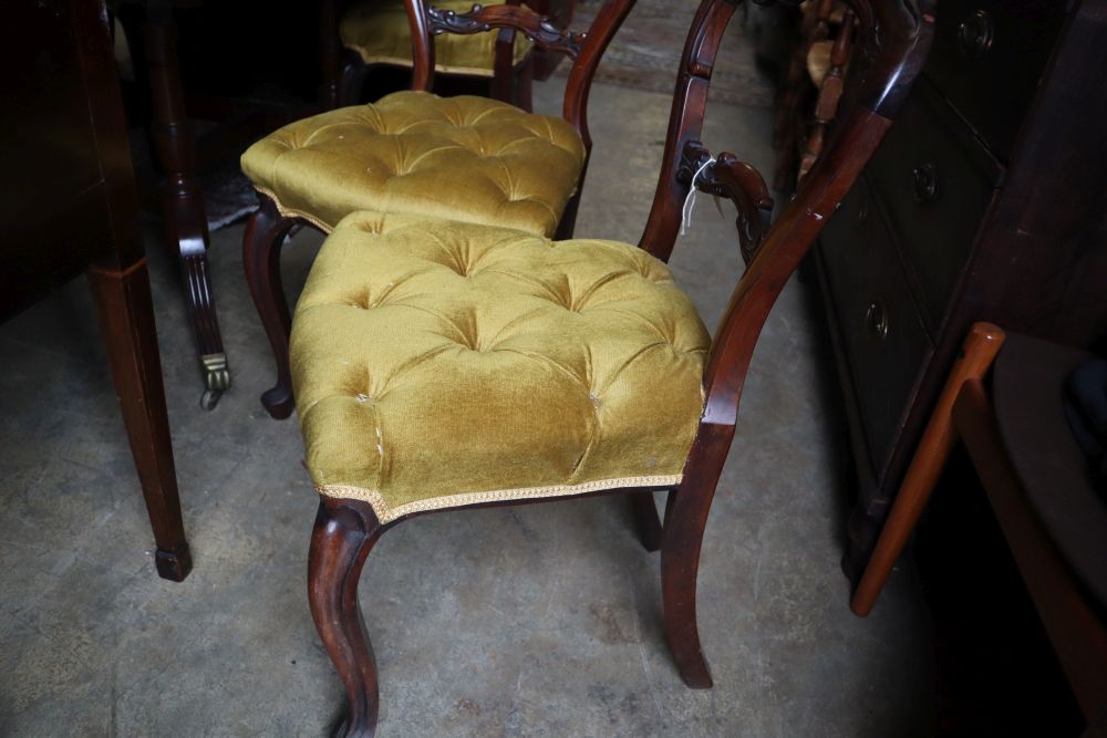 A set of six mid Victorian rosewood balloon back dining chairs with buttoned gold dralon seats